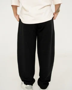 Black wide-leg trousers for women by Covra Pakistan