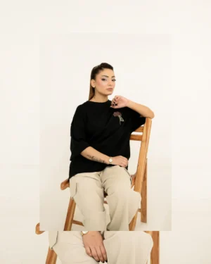 Black dropped shoulder embroidered t-shirt for women by Covra Pakistan