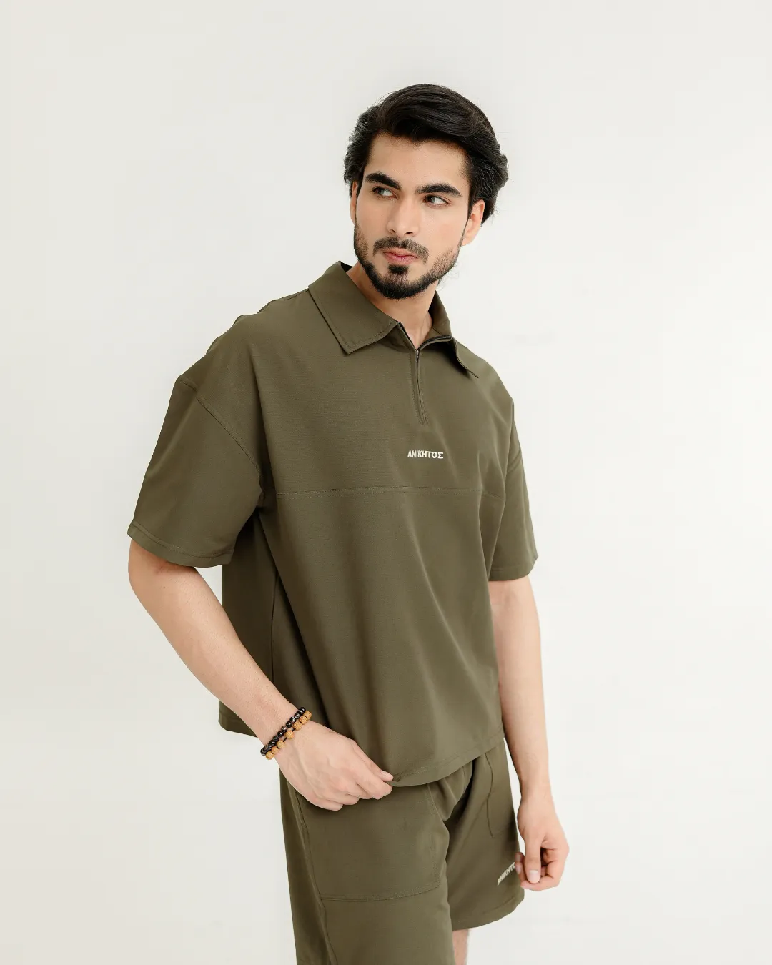 Olive Zip-Collar Co-Ord Shorts Set for Men 11 Olive zip-collar co-ord set for men front fit by Covra Pakistan
